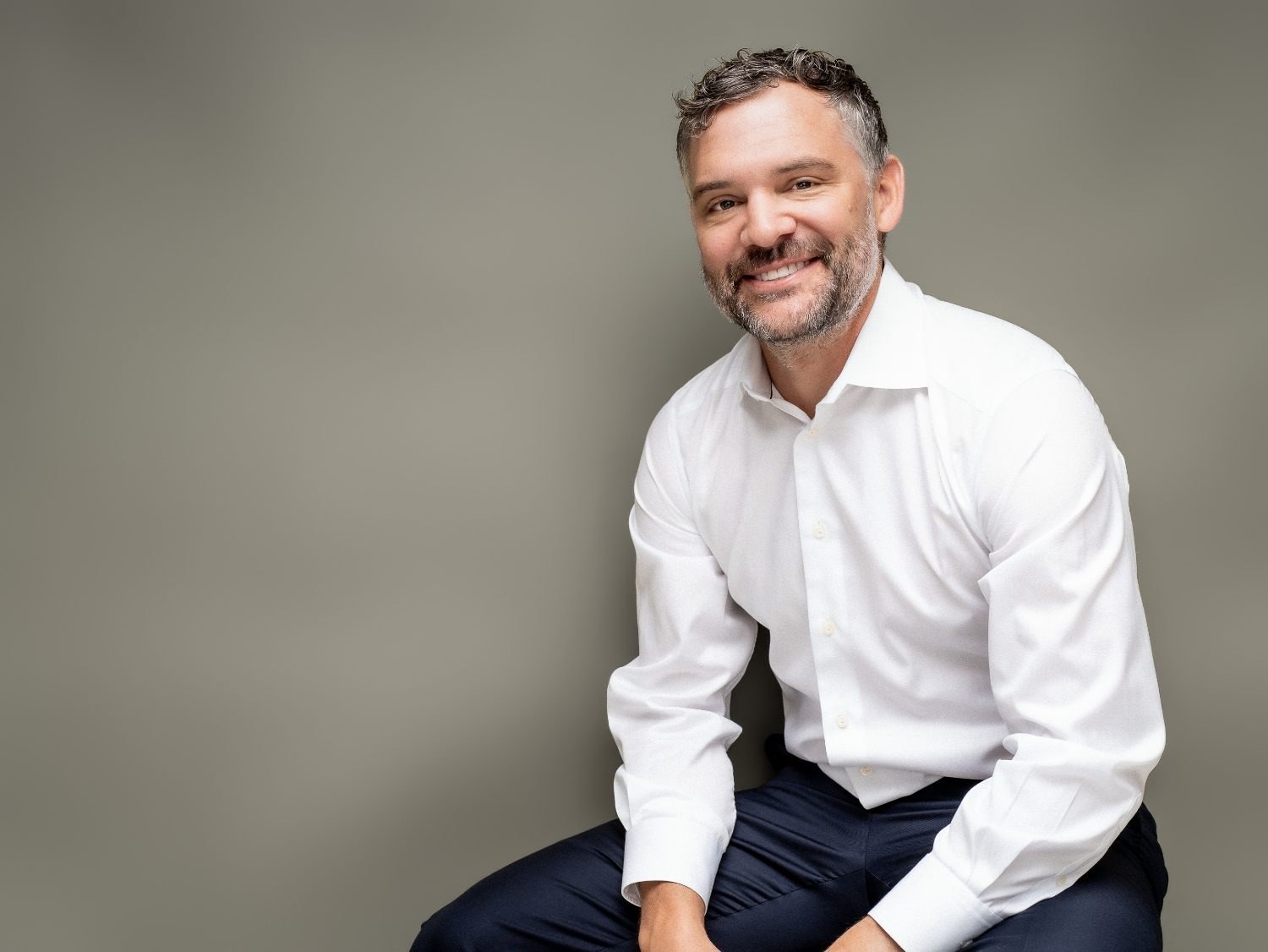 Professional portrait of a financial advisor in his office