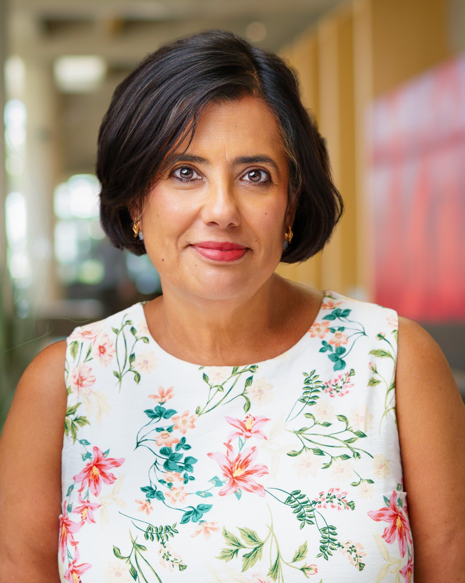 On-location headshot photographed in a client's workplace