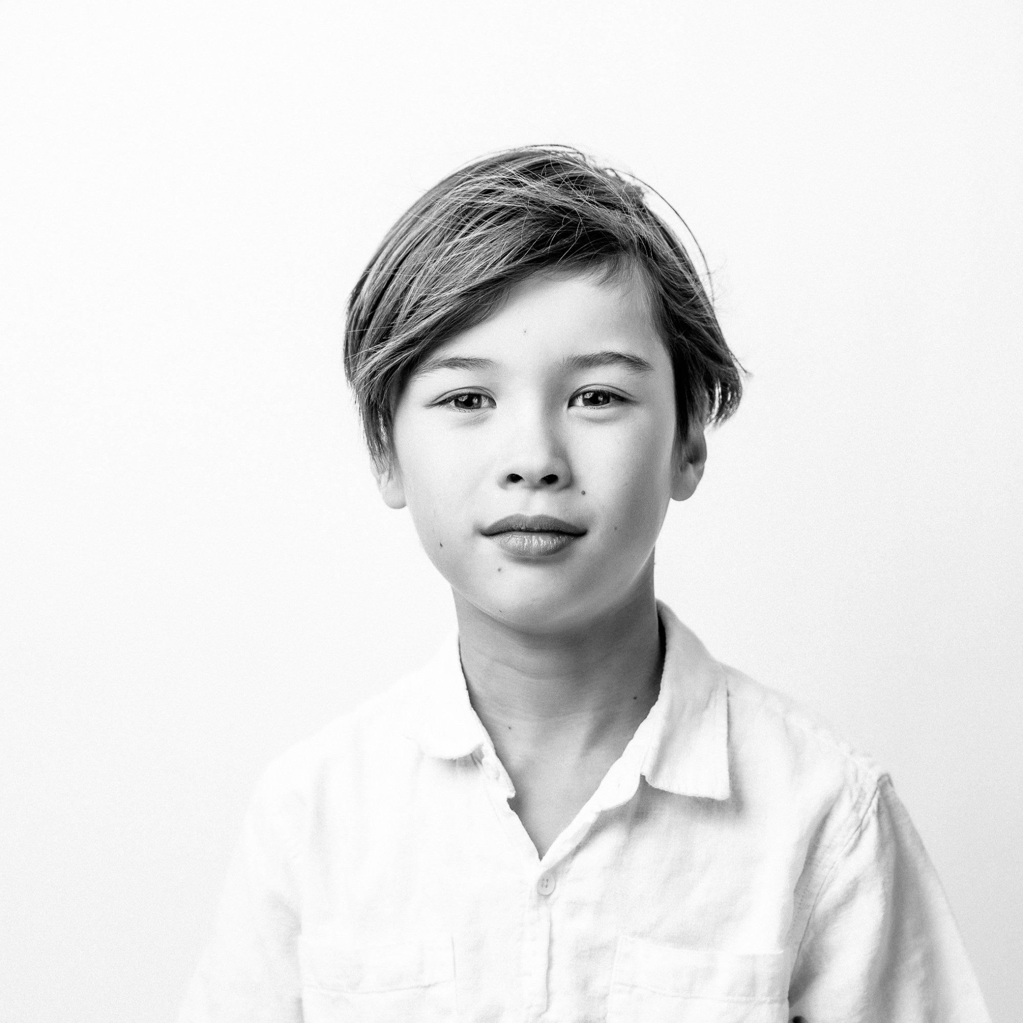 Individual studio portrait on a dark background